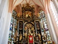 Mondsee/Austria - june 2 2019: detail of the altar at the interior of the basilika of St Michael