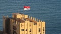 Monegasque Flag on the Top of a Building