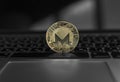 Monero coin symbol on laptop, future concept financial currency, crypto currency sign. Blockchain mining. Digital money