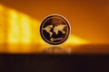 Monero icon. Gold Crypto currency BTC Bitcoin on black background. Golden Bit Coin virtual cryptocurrency or blockchain