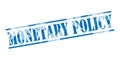 Monetary policy blue stamp Royalty Free Stock Photo