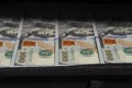 The money. American dollar, banknotes hundred dollars a pack on