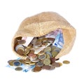 Money bag with coins and banknotes isolated over white Royalty Free Stock Photo