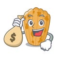 With money bag cookies in the form madeleine cartoon Royalty Free Stock Photo