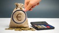 Money bag with a euro sign and calculator. Family or company budget concept. Income and profit. The accumulation of capital.