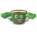 With money bag Indian masala tea in cartoon cup Royalty Free Stock Photo