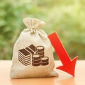 Money bag near a red arrow down. Recession of economy. Economic decline. Devaluation. Crisis and economic shock. Decrease Royalty Free Stock Photo