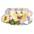 With money bag oolong tea poured in character cup Royalty Free Stock Photo