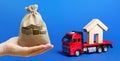 Money bag, red truck carrier with a house figure on a blue background. Cargo transportation and delivery service. A moving company