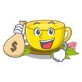 With money bag turmeric tea isolated in the character Royalty Free Stock Photo