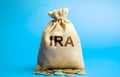 Money bag with the word IRA - individual retirement account. Tax-advantaged account that individuals use to save and invest for Royalty Free Stock Photo