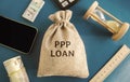 Money bag with the word PPP loan - Paycheck Protection Program. Loan designed to provide a direct incentive for small businesses Royalty Free Stock Photo