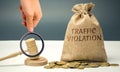 Money bag with the word Traffic violation and the judge`s hammer. Law. Court. Fine, legal fees. Traffic Tickets. Speeding. Failur Royalty Free Stock Photo