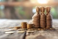 Money bags and coins on wooden background Royalty Free Stock Photo