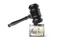 Money banknotes and judge gavel over white background Royalty Free Stock Photo