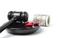 Money banknotes, pill capsules and judge gavel over white background Royalty Free Stock Photo