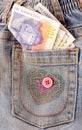Money in blue jeans Royalty Free Stock Photo