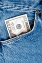 Money in blue jeans pocket Royalty Free Stock Photo