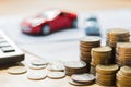 money and blur toy car with calculator. concept finance and insurance Royalty Free Stock Photo