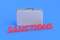 Money briefcase with word sanctions. Severe financial constraints