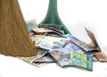 Money and broom Royalty Free Stock Photo