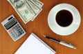 Money, calculator, notepad and pen Royalty Free Stock Photo