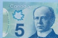 Money from Canada: Canadian Dollars. Detail close up shot Royalty Free Stock Photo