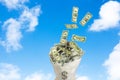 Money cash falling from the sky to the bag with dollars ,sky with clouds background,success concept Royalty Free Stock Photo