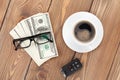 Money cash, glasses, car remote and coffee cup Royalty Free Stock Photo