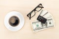 Money cash, glasses, car remote and coffee cup Royalty Free Stock Photo