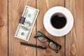 Money cash, glasses, pen and coffee cup Royalty Free Stock Photo