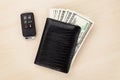 Money cash wallet and car remote key Royalty Free Stock Photo