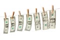Money on clothes line isolated Royalty Free Stock Photo