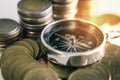 Money coins and Ancient compass.business finance investment concept