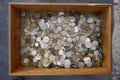 Money, coins, collection of old, invalid international coins, in a wooden box, Royalty Free Stock Photo