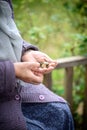 Money, coins, the grandmother on pensions and a concept of a living minimum - in hands of the old woman isn`t enough money Royalty Free Stock Photo