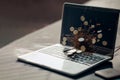 Money coins pouring out from a notebook computer Generative AI Royalty Free Stock Photo