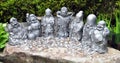 Money coins and Seven lucky gods statues at Daisho-in temple, Miyajima island Japan Royalty Free Stock Photo