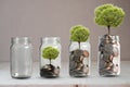 Money coins and tree growing in jar. Profit on deposit in bank and dividend for stock investment concept Royalty Free Stock Photo