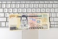 Money on Computer Keyboard