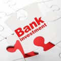 Money concept: Bank Investment on puzzle background Royalty Free Stock Photo