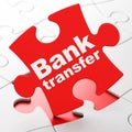 Money concept: Bank Transfer on puzzle background Royalty Free Stock Photo