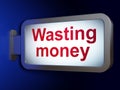 Money concept: Wasting Money on billboard background Royalty Free Stock Photo