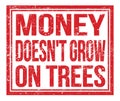 MONEY DOESN`T GROW ON TREES, text on red grungy stamp sign