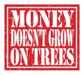 MONEY DOESN`T GROW ON TREES, text written on red stamp sign