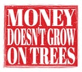 MONEY DOESN`T GROW ON TREES, text on red stamp sign