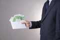 Money in an envelope in the hands of men Royalty Free Stock Photo