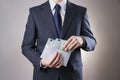 Money in an envelope in the hands of men Royalty Free Stock Photo