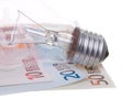Money Euros with lamp Royalty Free Stock Photo