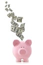 Money Falling Into Piggy Bank